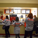 Bernie Sanders supporters order food at the McIntyre-Shaheen 100 Club Celebration on Friday in Manchester, NH.